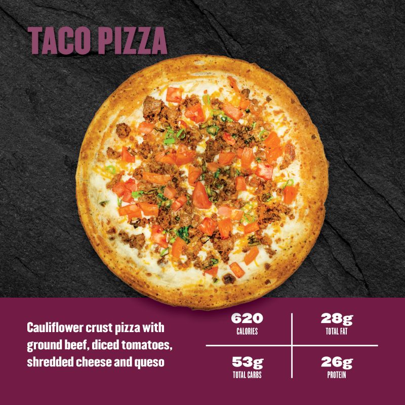 Taco Pizza — Clean Eatz Kitchen cauliflower crust pizza with ground beef, diced tomatoes, shredded cheese, and queso; 620 calories, 28g fat, 53g carbs, 26g protein.